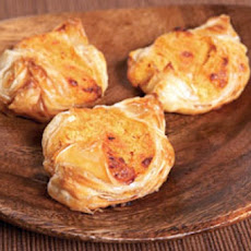 Baked Brie Pastries With Artichoke and Prosciutto