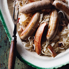 German Sausages with Apples, Sauerkraut, and Onion