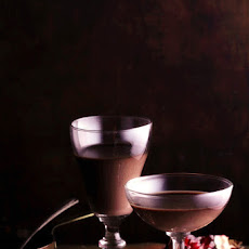 Chocolate Panna Cotta with a Port Wine Pomegranate Sauce