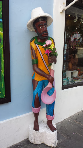 Man With Flowers Statue