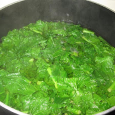 Neelys' Braised Mustard Greens With Bacon and Raisins