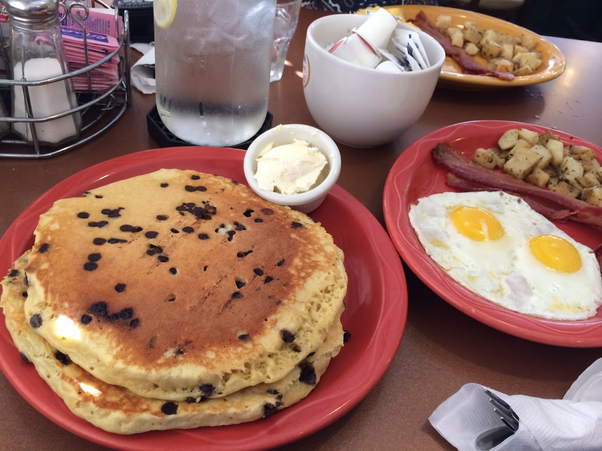 Chocolate Chip GF Pancakes, Eggs, Bacon and Peasant Potatoes. This meal was huge. The pancakes are a
