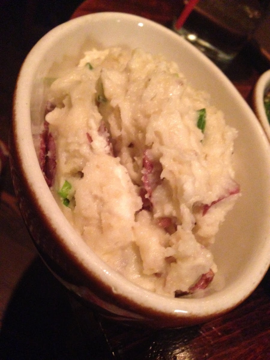 Goat cheese mashed potatoes with bacon and chives. Yum!