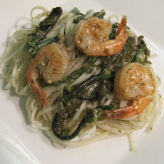 Sauteed Pohole (Fern shoots) and Shrimp with Lemon Balm Pesto on Rice Noodles