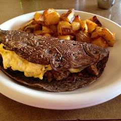 Buckwheat Breakfast Crepe with eggs, ham and fries.
