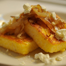 Griddled Polenta Cakes with Caramelized Onions, Goat Cheese, and Honey