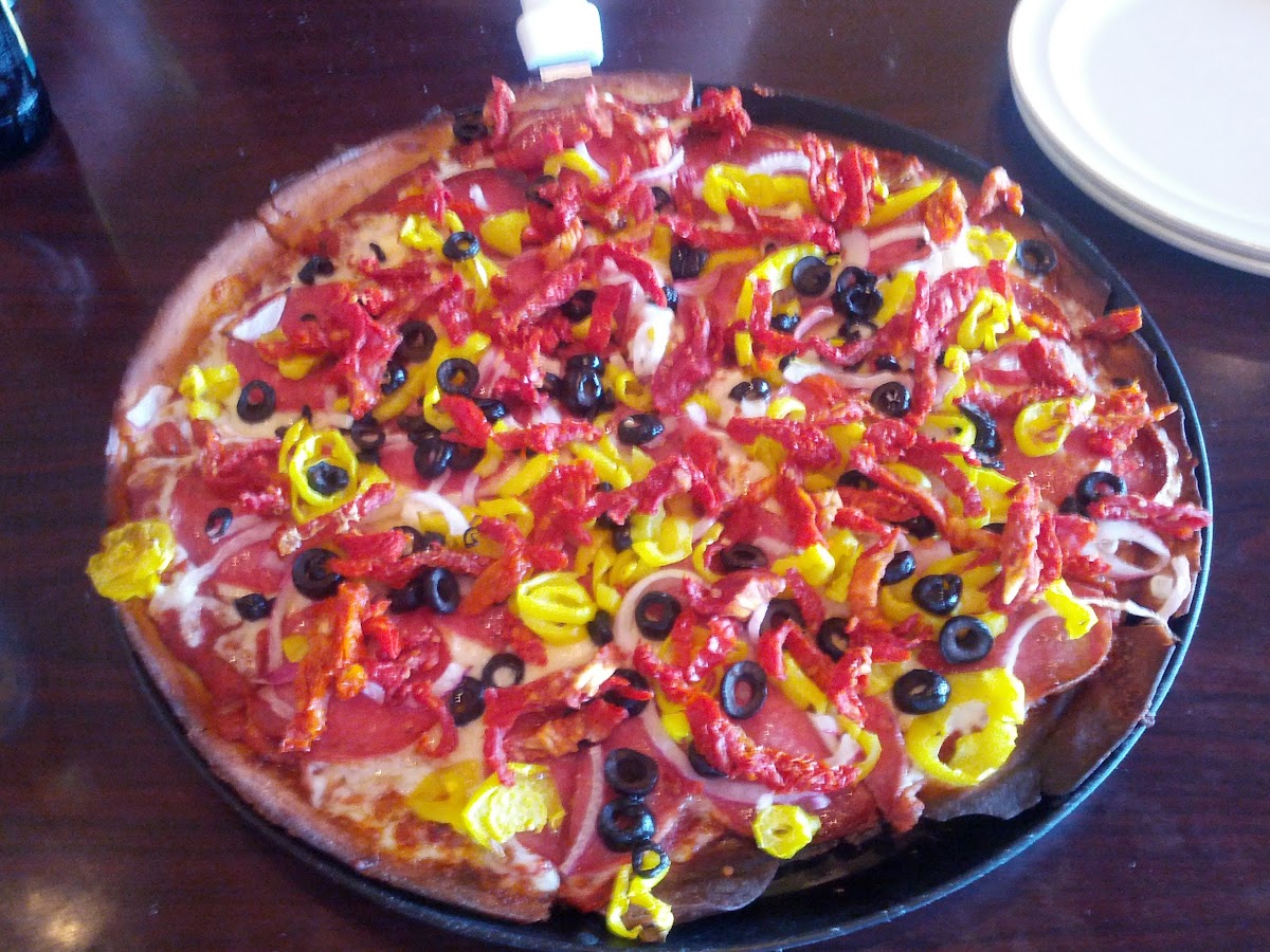 Mediterranean with salami, sun dried tomatoes, red onion, banana peppers and black olives