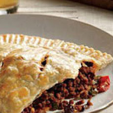 Beef Empanadas with Raisins and Pickled Peppers