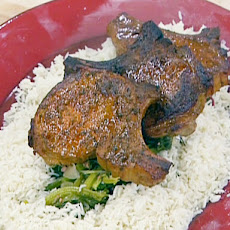 Hickory-Smoked Pork Chops with Braised Greens and Green Onion Rice Pilaf