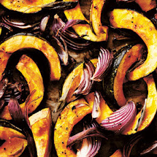 Baked Pumpkin with Lemon, Sautéed Greens, and Toasted Cumin Dressing