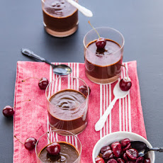 Chocolate pots de creme with red wine poached cherries
