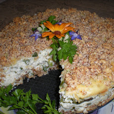 Savory Asparagus Ricotta Cheesecake with Almond Swiss Cheese Crust and Topping.