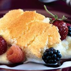 Meyer Lemon Buttermilk Pudding Cake with Fresh Berries