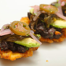Fried Plantains with Black Beans, Roasted Poblanos, Avocado, and Pickled Red Onion