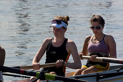 two rowers pull (facing left) tow rowers pull (facing left)