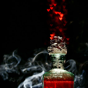 Love Potion #9 by Sondra Sarra - Artistic Objects Other Objects ( love, hearts, red, liquid, love potion #9, white, bubbles, potion, bottle, bokeh, black, smoke )