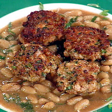 Grilled Rabbit Sausage over Stewed White Beans