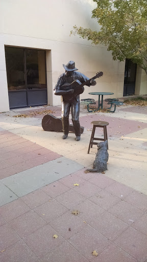 Guitar Player with Dog