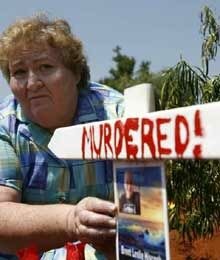 [MarlothPark crosses like this are seen all over SA to mourn the tens of thousands of annual murder victims.jpg]