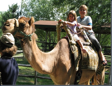 Mia and Sarah on a camel