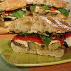 Grilled Eggplant and Fresh Mozzarella on Ciabatta with Roasted Red Peppers, Garlic Mayonnaise, Fresh Basil and Arugula
