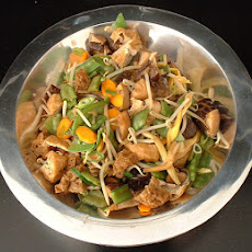 Stir-Fried Tofu With Mushrooms, Sugar Snap Peas, and Green Onion