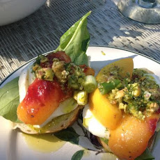 Mozzarella With Persimmon, Serrano Ham and Pistachio Fennel Oil Crostini