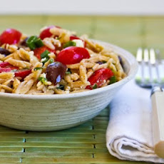 Whole Wheat Orzo Salad with Tomatoes, Kalamata Olives, Feta, and Herb Vinaigrette