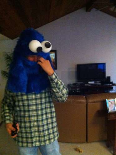 parents trying on cookie monster head