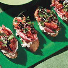 Bruschetta with Rosemary, Roasted Plum Tomatoes, Ricotta and Prosciutto