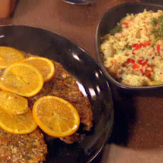 Spanish Chicken Cutlets and Olive Rice with Artichokes and Piquillo Peppers
