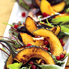 Dandelion Salad with Pomegranate Seeds, Pine Nuts, and Roasted Delicata Squash