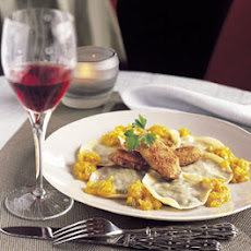 Lentil Ravioli with Sausage and Yellow Tomato Sauce