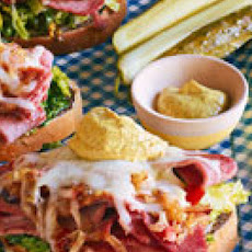Corned Beef Melts with Sweet and Sour Onions and Wilted Cabbage
