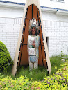 A statue of native american