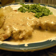 Pork Chops in Creamy Herbed Brandy Sauce