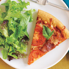 Pizza with Prosciutto, Tomatoes, and Parmesan Cheese