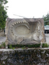 Steinskulptur Krokodil