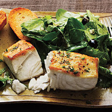 Halibut à la Provençal over Mixed Greens