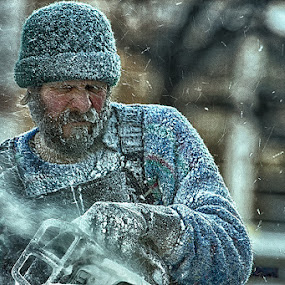 Old Man Winter 6 by Bill Tiepelman - People Street & Candids ( minnesota, winter, cold, sculpting, ice, carving, saint paul winter carnival, chainsaw, man )