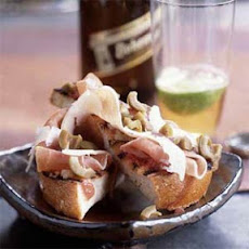 Grilled Bread with Serrano Ham, Manchego, and Olives