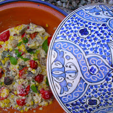 Creamy corn, mushroom and cherry tomatoes cooked in a tagine