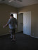 Nick envisioning where the bed will go in the master bedroom.