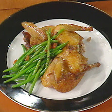 Roasted Squab Stuffed with a Creole Rice Dressing