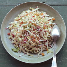 Shredded Napa Cabbage Salad with Radishes, Golden Raisins, and Dijon Dressing