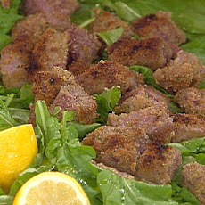 Beef Tenderloin Bites on a Bed of Arugula