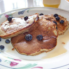 Banana Pecan Pancakes Served With Berries