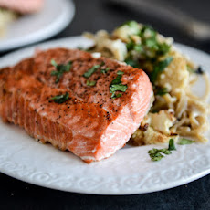 Broiled Salmon and Roasted Garlic Cream Noodles with Crispy Cauliflower + Toasted Pine Nuts