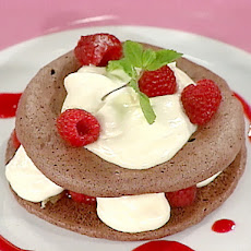 White Chocolate Mousse in Chocolate Meringue Shells with Raspberry Coulis