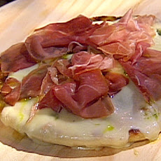 Grilled Pizza with Prosciutto, Pesto and Taleggio Cheese